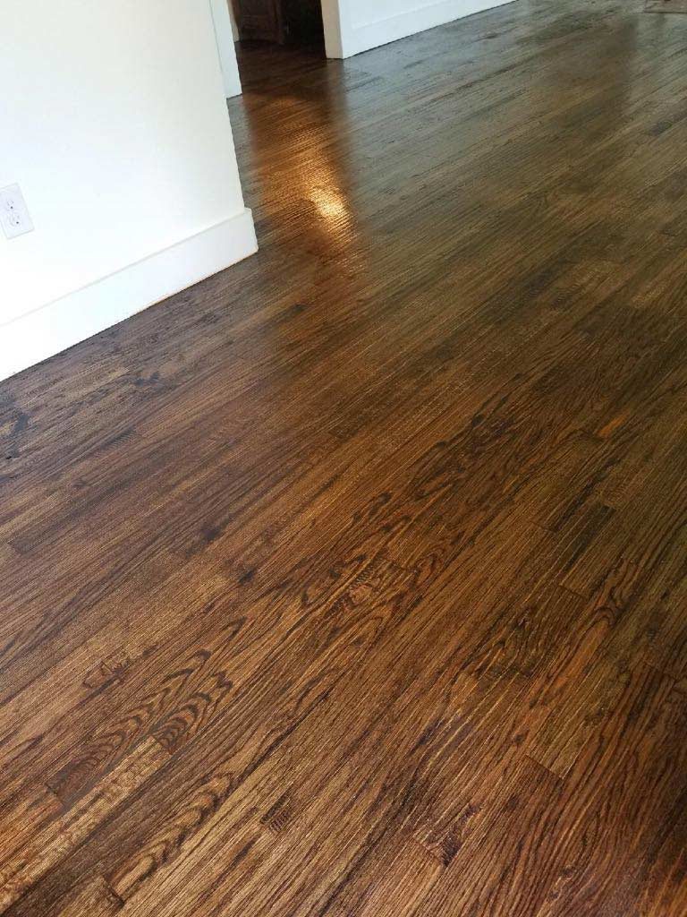 closeup-of-hardwood-floors-in-room-with-white-walls-fort-worth-tx